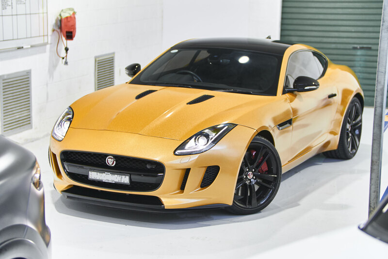 Jaguar car wrapped in Gold Metallic vinyl