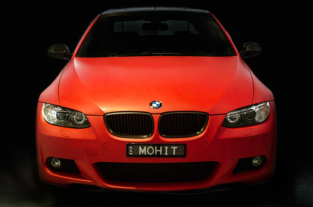 Full body wrap, a smouldering red BMW 3 Series coupe